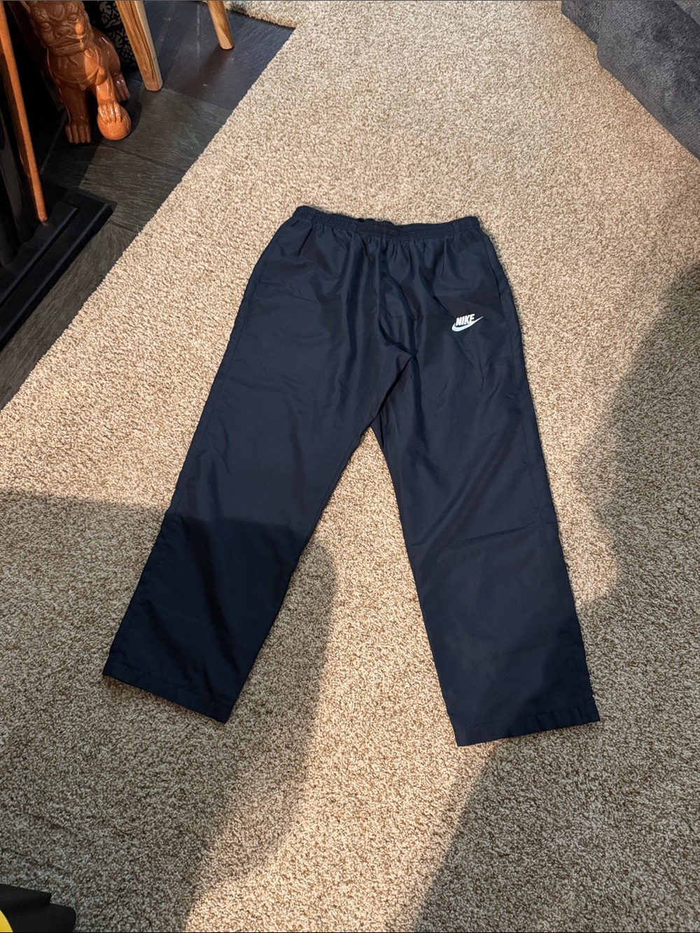 Nike Blue Pants with White Swoosh Logo